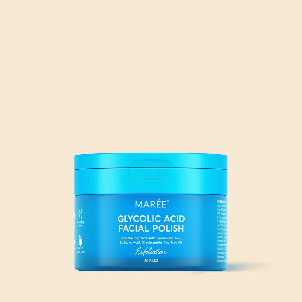 A blue jar of MARÉE Glycolic Acid Facial Polish centered on a solid beige background.