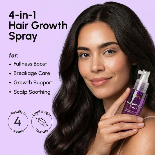 Woman holding a hair growth spray with product details on a purple background