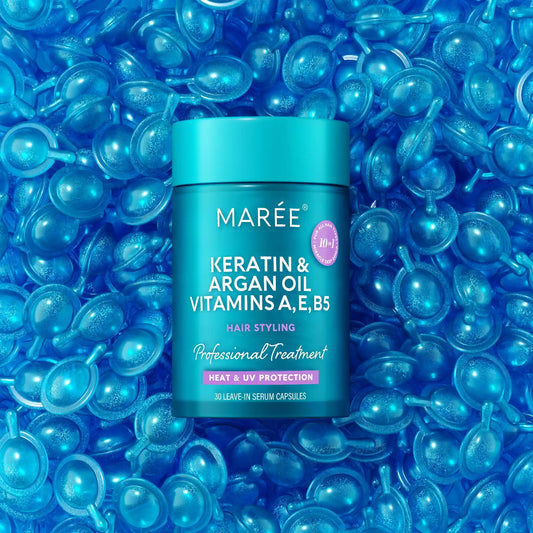 A teal jar of MARÉE Keratin & Argan Oil Vitamins A,E,B5 hair styling capsules, surrounded by a dense background of blue translucent capsules.