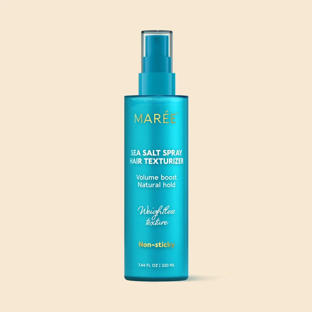 Blue bottle of Maree Sea Salt Spray Hair Texturizer on a beige background