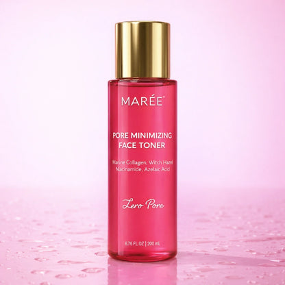 A bottle of MARÉE Pore Minimizing Face Toner with a shiny gold cap and pink liquid inside, set against a soft pink background with water droplets on the surface.
