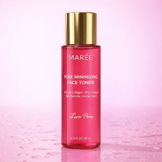 A bottle of MARÉE Pore Minimizing Face Toner with a shiny gold cap and pink liquid inside, set against a soft pink background with water droplets on the surface.