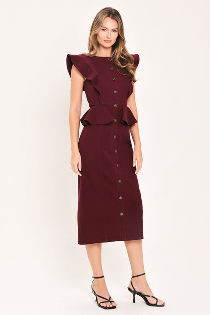 A woman modeling a sleeveless burgundy midi dress with ruffled cap sleeves, a button-front bodice, and a peplum waist, photographed against a plain light background.