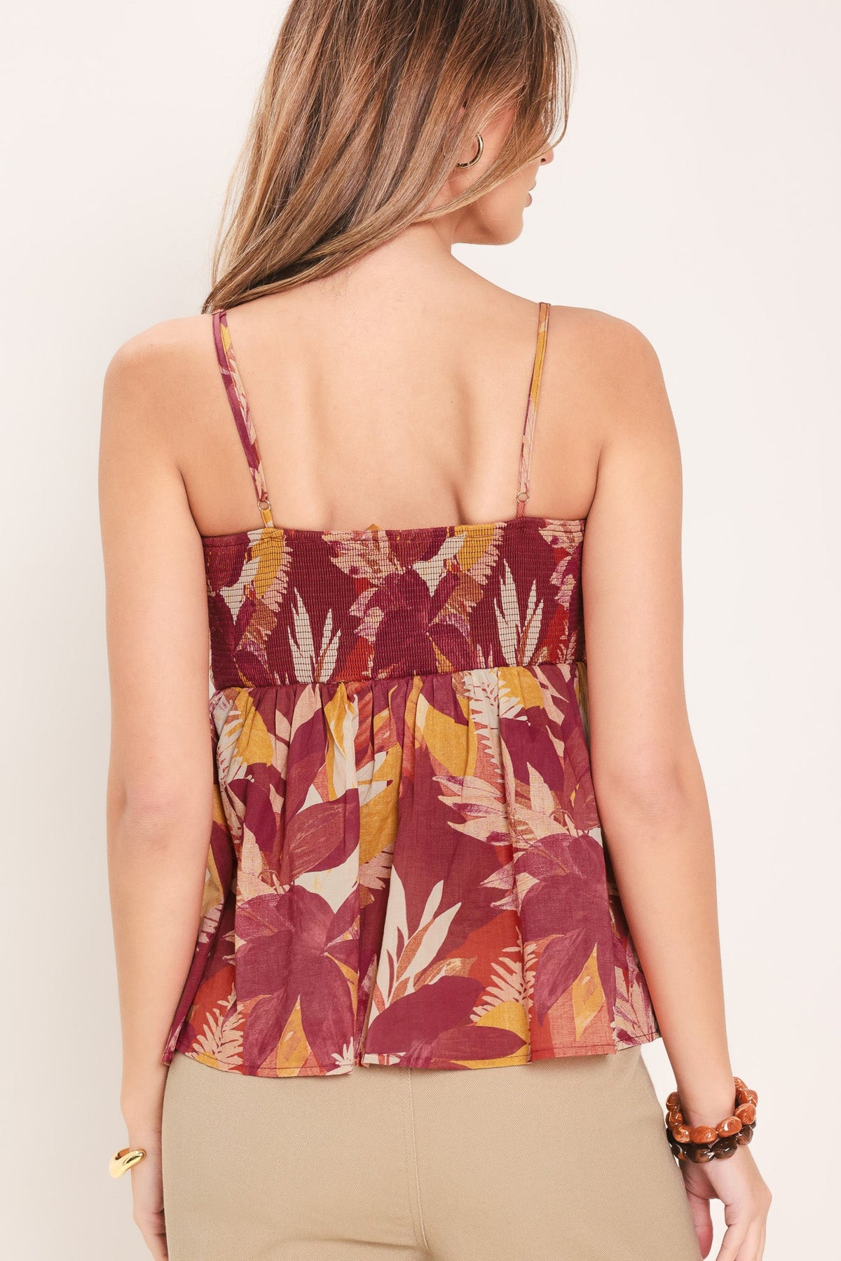 Model wearing the burgundy printed cotton top with matching burgundy floral palazzo pants.