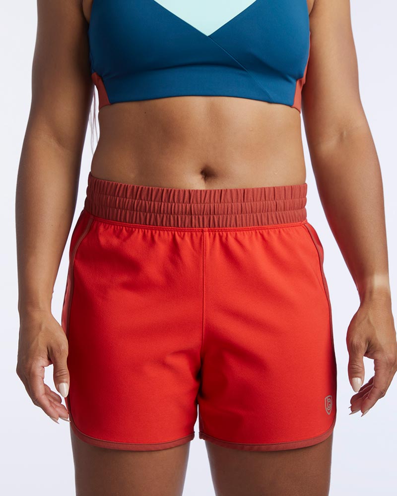 Indie Women's Sport Shorts in Poppy Cinnabar, front view