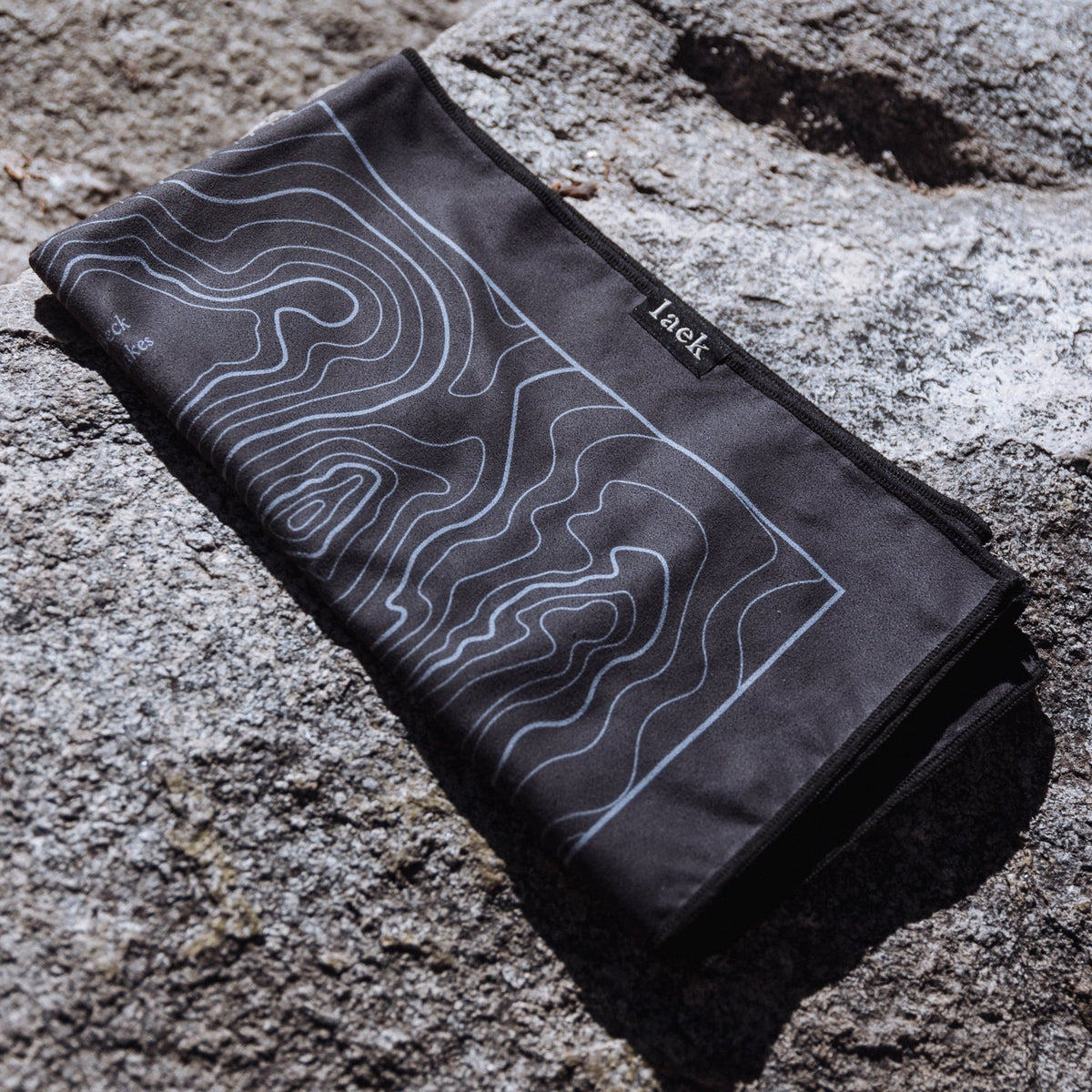 Laek Terrain Towel in Topo Black, shown as a backpacking towel