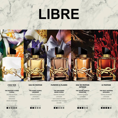 The Yves Saint Laurent Libre collection of perfume bottles on a marble background