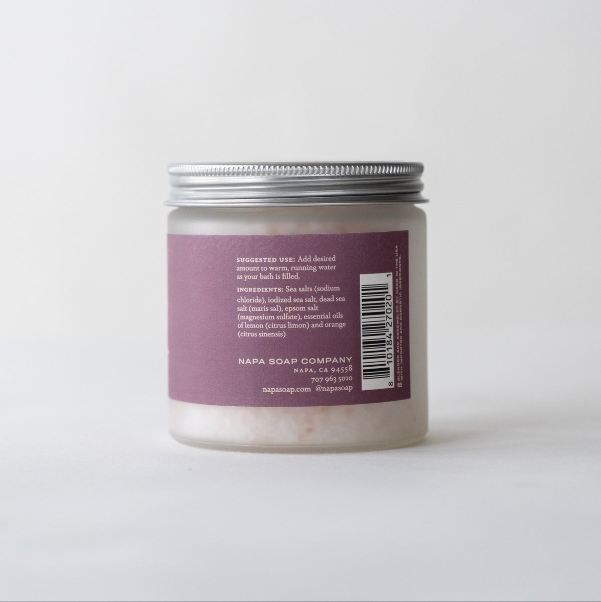 Lavender bath salt soak jar with a purple label on a white background