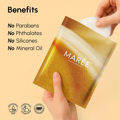 Hand holding a package of MARé wipes with benefits listed on a beige background
