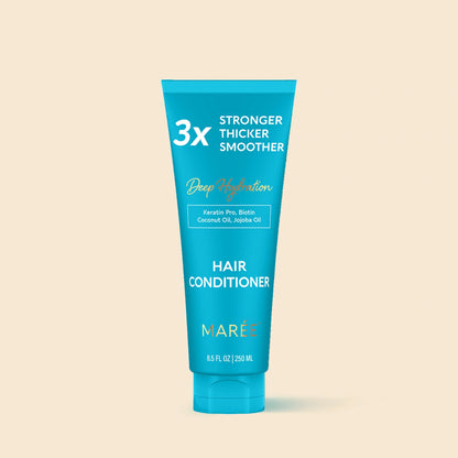 Blue hair conditioner tube with text on a beige background