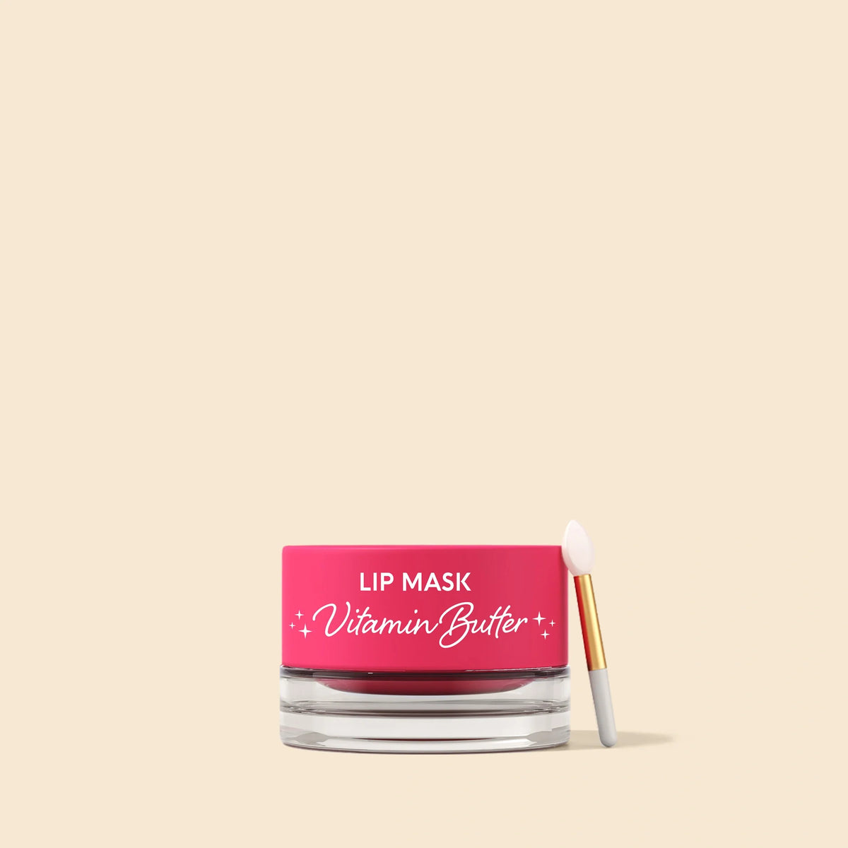 Lip mask with pink container and applicator on a beige background