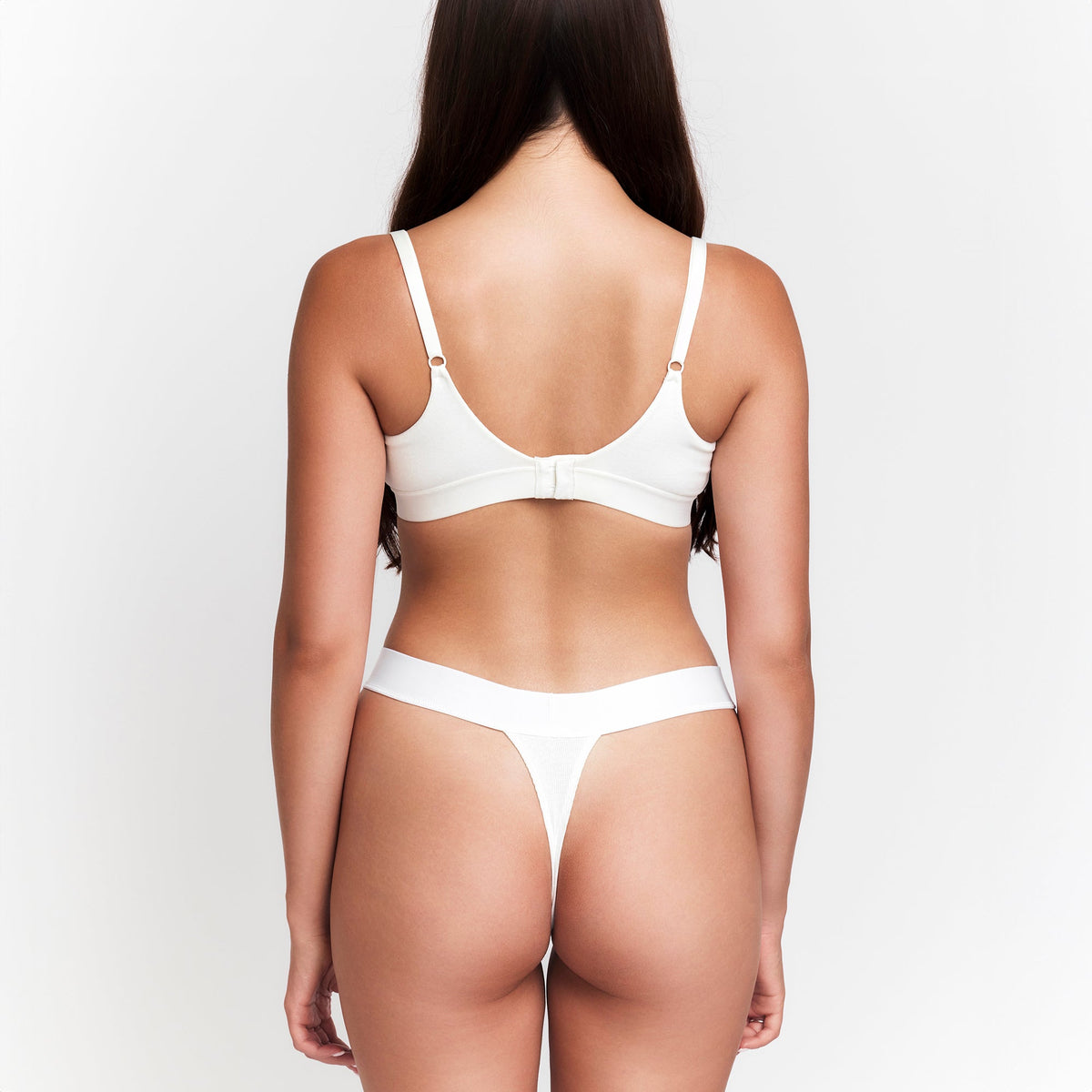 Botanical Dye Thong in Milk, product photo on a plain background