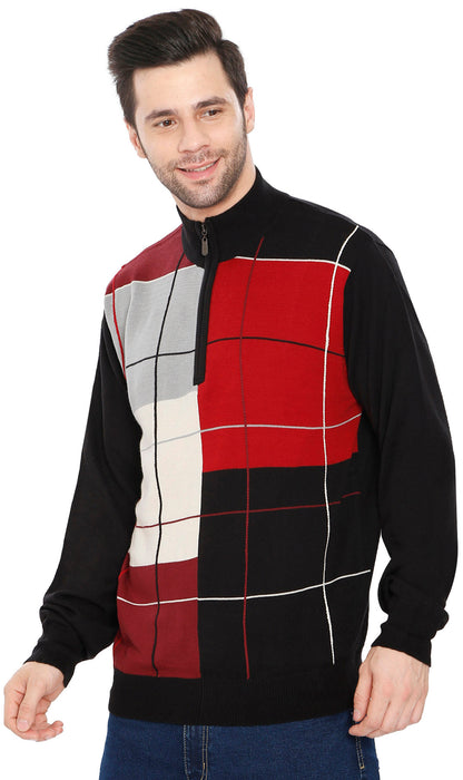Man wearing a colorful checkered sweater with a white background