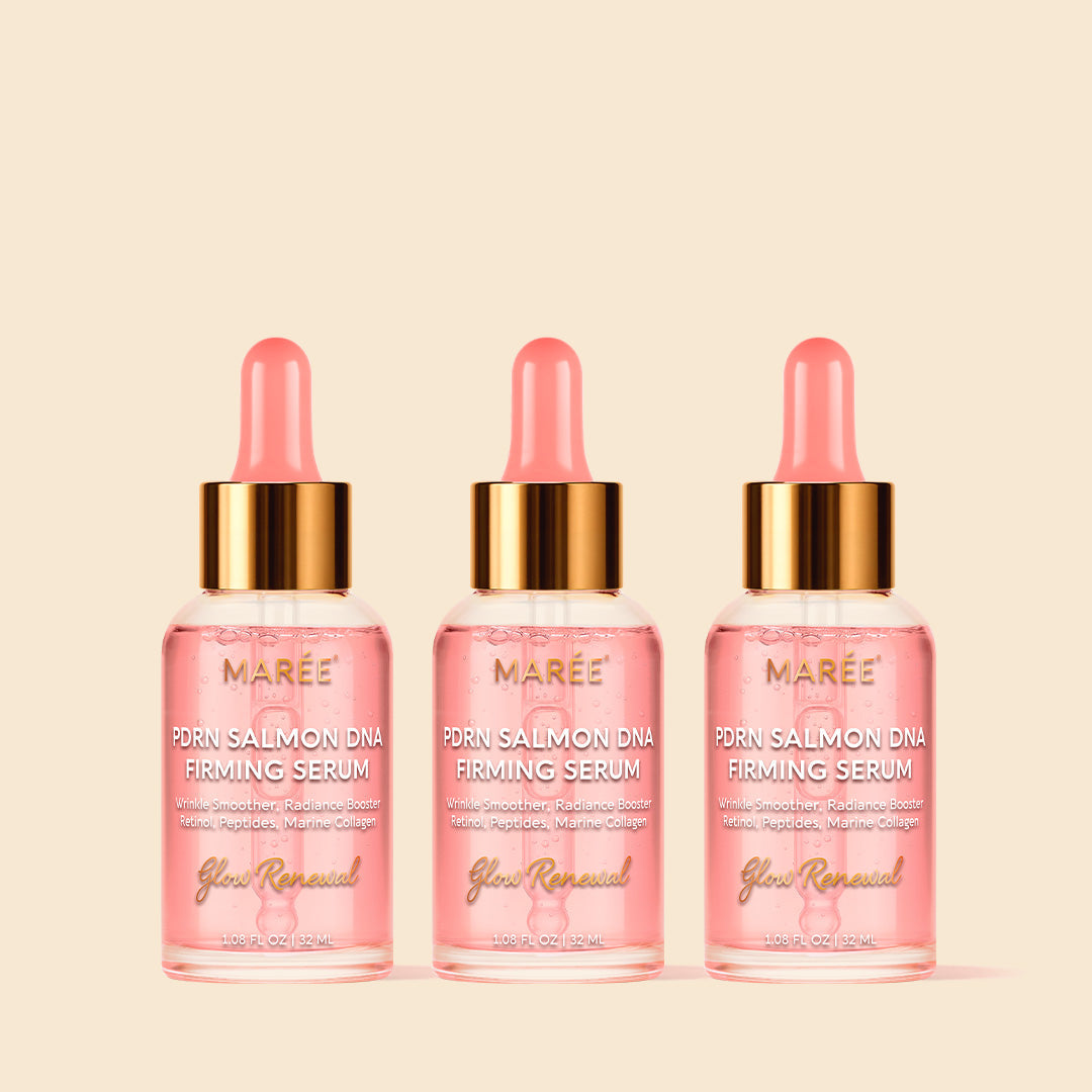 Three bottles of Maree Prawn Salmon DNA Firming Serum on a beige background