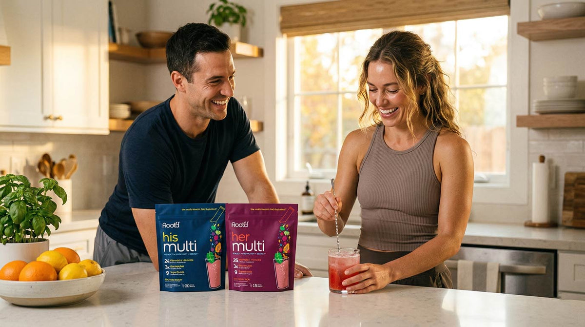 Man and woman in a kitchen with Revel his multi and her multi packaging.