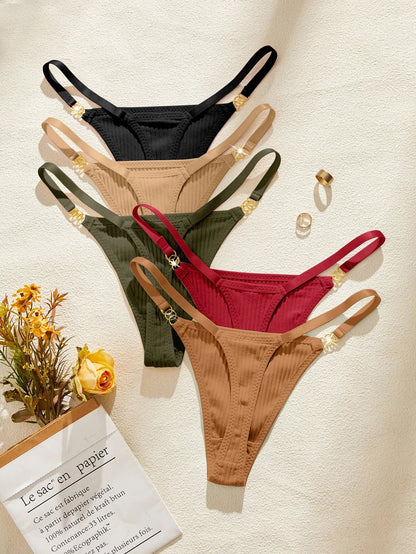 Four pairs of women's underwear in black, beige, green, and red on a light background.