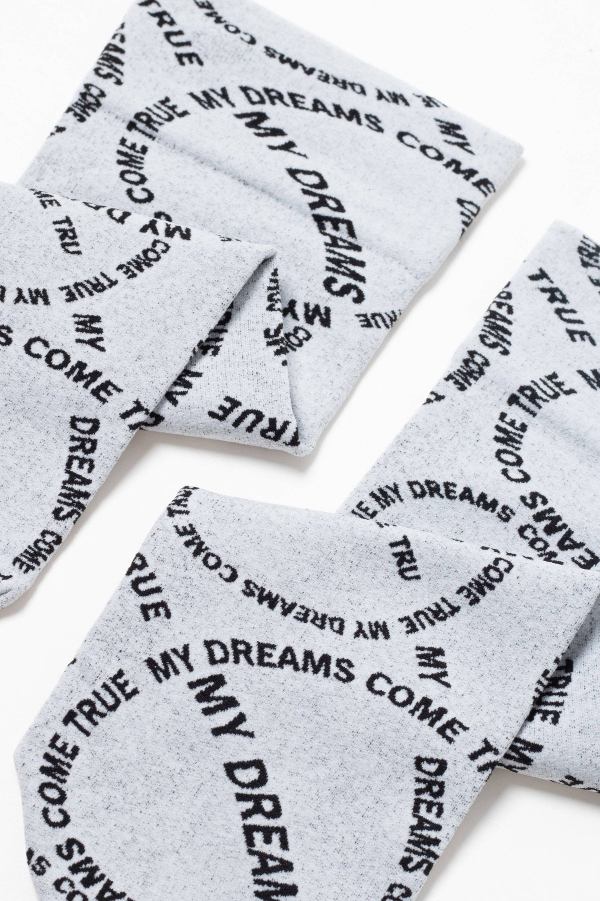 Conte Fantasy dense socks with knitted My dreams design, styled photo