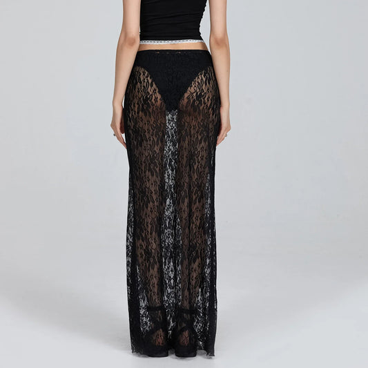 Black lace skirt worn by a person on a gray background