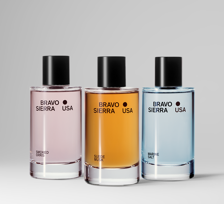 Three bottles of Bravo Sierra USA colognes on a gray background