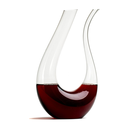 Wine decanter with red wine on a white background