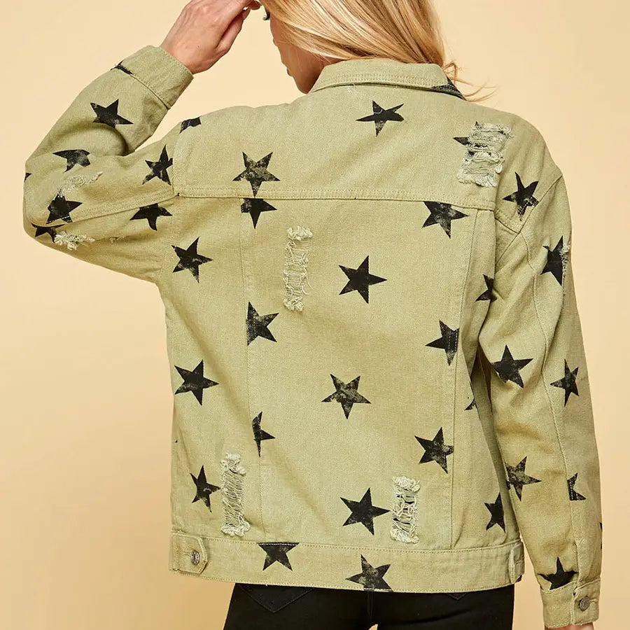 Green jacket with star patterns on a beige background