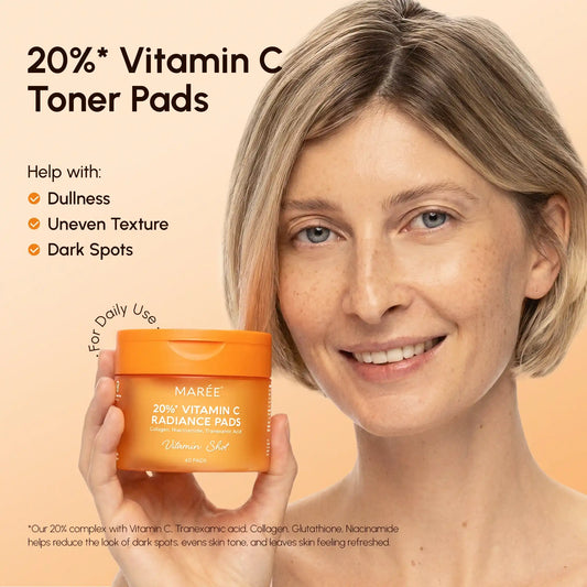 Woman holding a jar of 20% Vitamin C Toner Pads with text about product benefits on a beige background