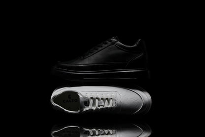 Black leather shoe with 'Caliro' branding on a black background