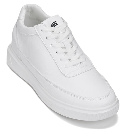 A white low-top sneaker with a thick platform sole, white laces, and a small black logo on the tongue, shown on a clean white background.