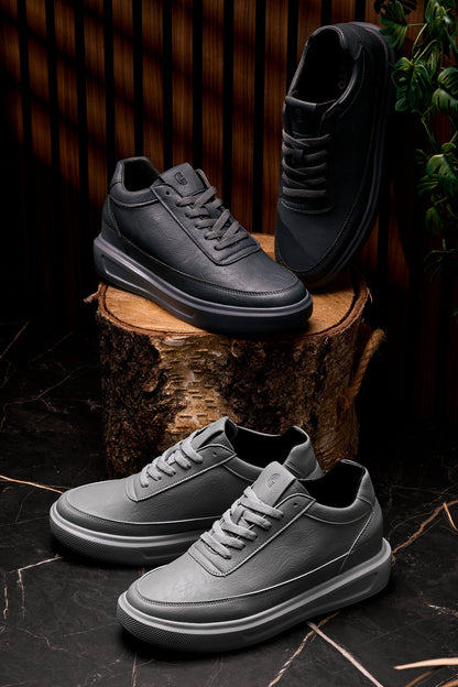 CALTO X1648 and X1649 elevator sneakers photographed together