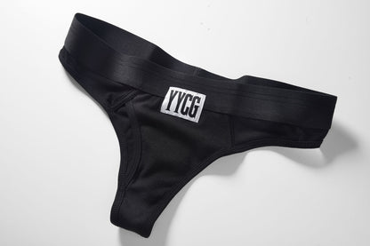 Black men's underwear with 'YYC' label on a white background