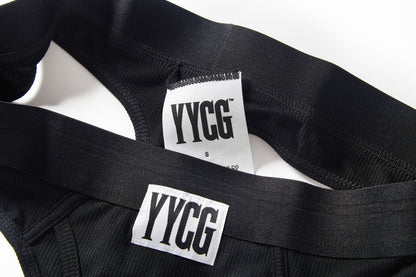 Black underwear with YYCG labels on a white background