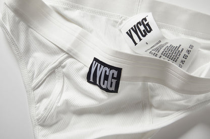 White athletic garment with YYCG branding on a light gray background