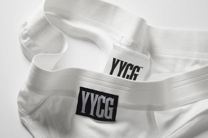 White fabric with 'YYCG' labels on a light gray background