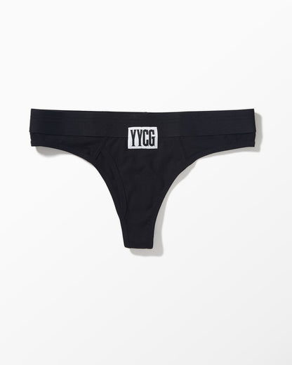 Black thong with 'YYC' logo on a white background