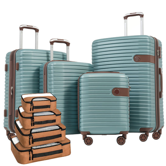 4-Piece Hard Shell Expandable Luggage Set in Blue with brown trim, shown with its packing cubes, telescoping handles, spinner wheels and front lock