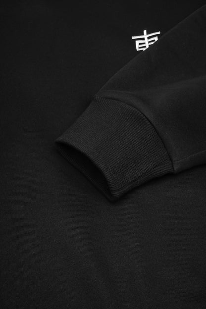 Black long-sleeve shirt with a white logo on a black background