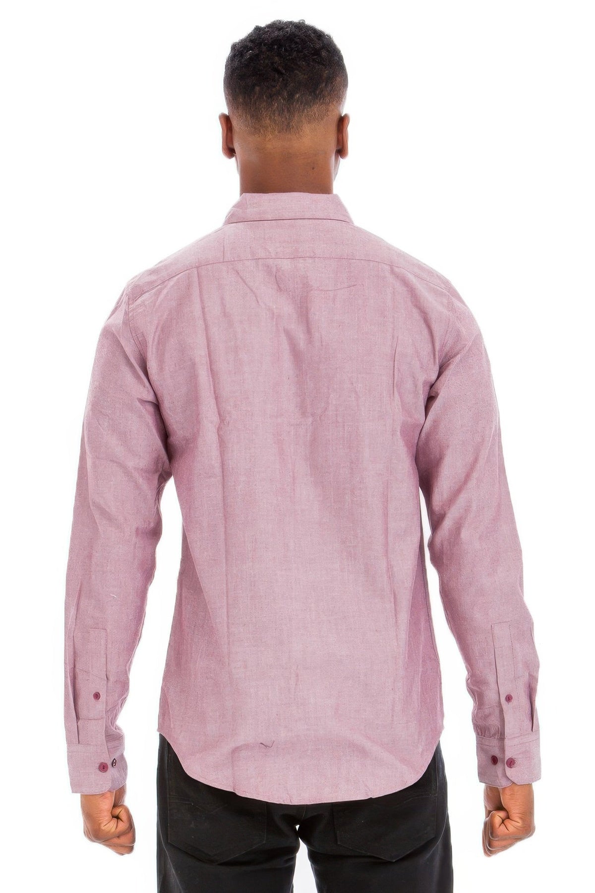 Person wearing a pink checkered shirt on a white background