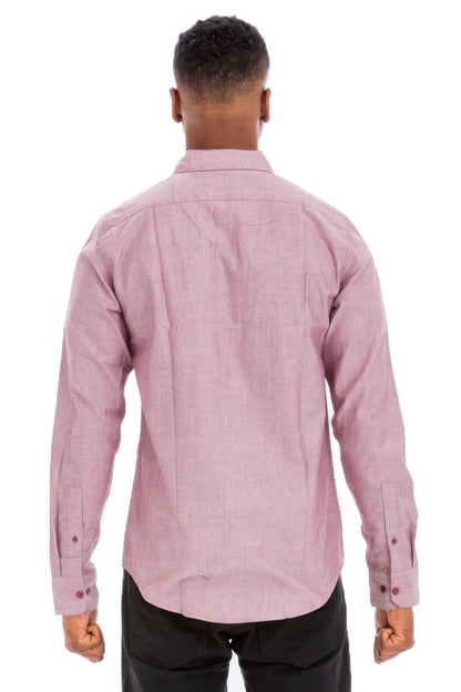 Person wearing a pink checkered shirt on a white background
