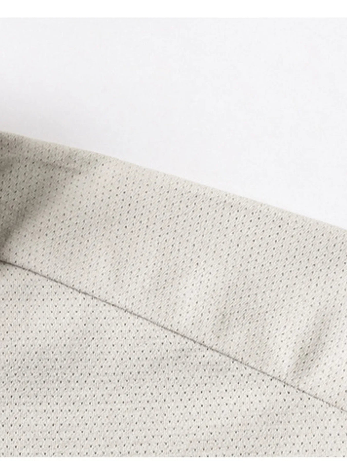 Close-up of textured fabric with a white background