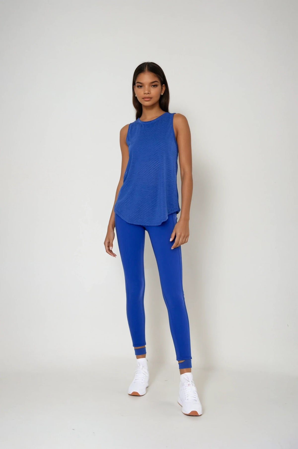 Breathe Easy Cut-Out Back Sports Bra in Blue, styled photo
