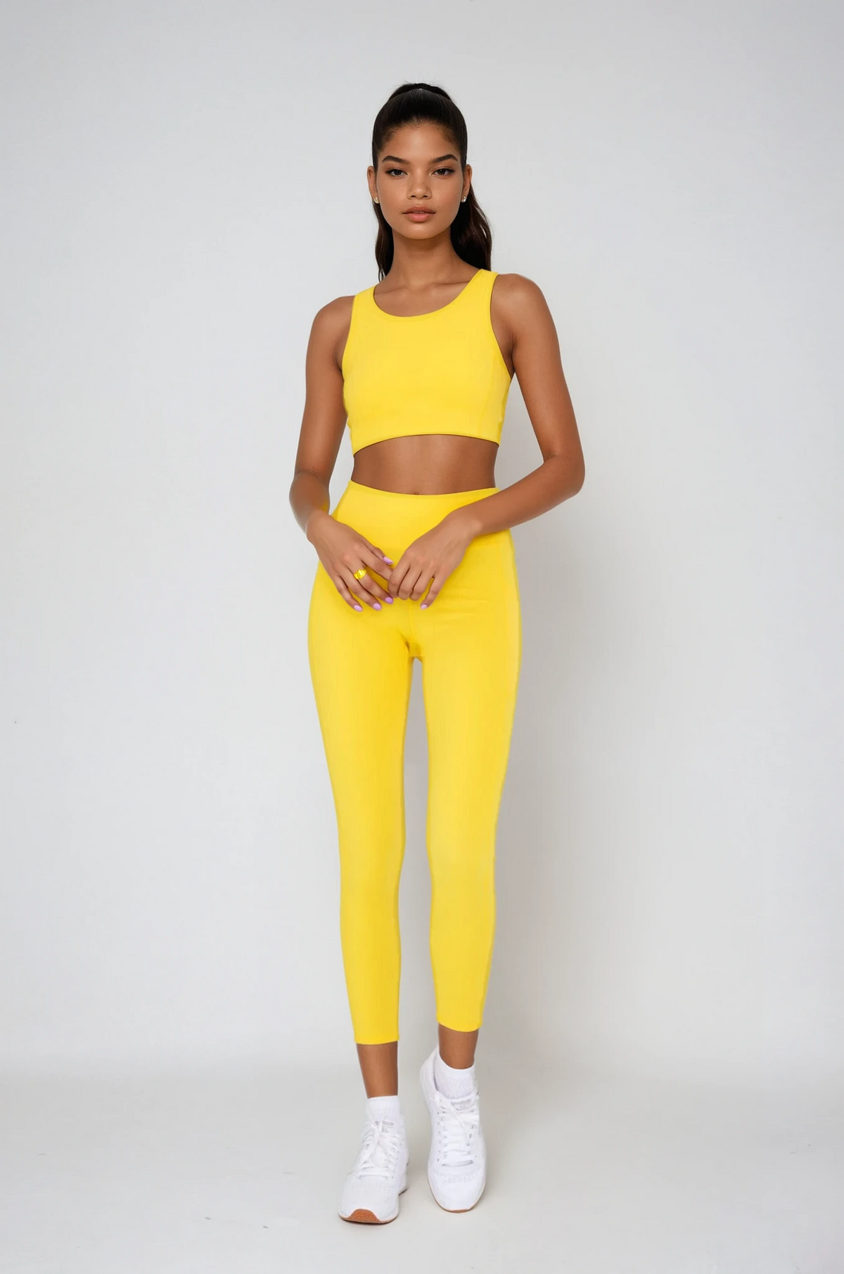 Power Flow Cropped Leggings with Pockets in Yellow, studio photo