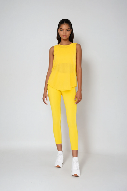 Power Flow Cropped Leggings with Pockets in Yellow, studio photo (3)
