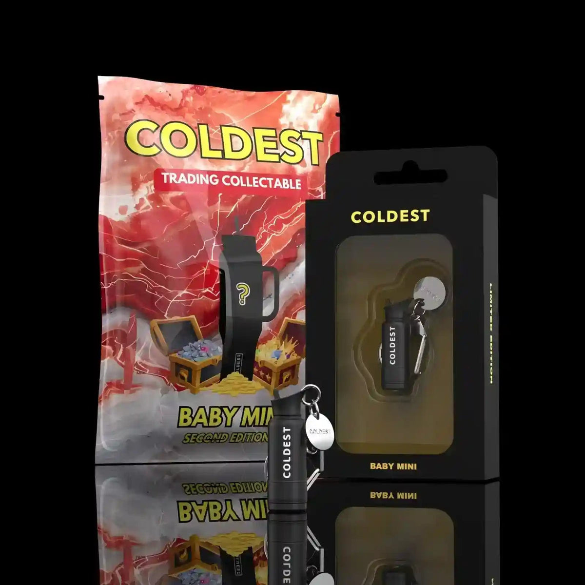 A product display featuring a 'COLDEST Trading Collectable' 'Baby Mini Second Edition' mystery pouch next to two black retail boxes containing matching black keychain collectibles labeled 'COLDEST BABY MINI'.
