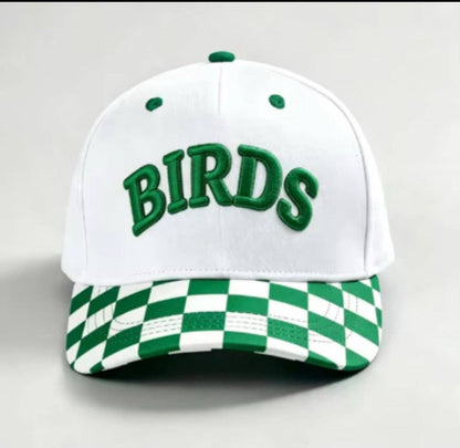 A white baseball cap with green embroidered 'BIRDS' lettering on the front and a green and white checkered pattern on the brim, shown against a light gray background.