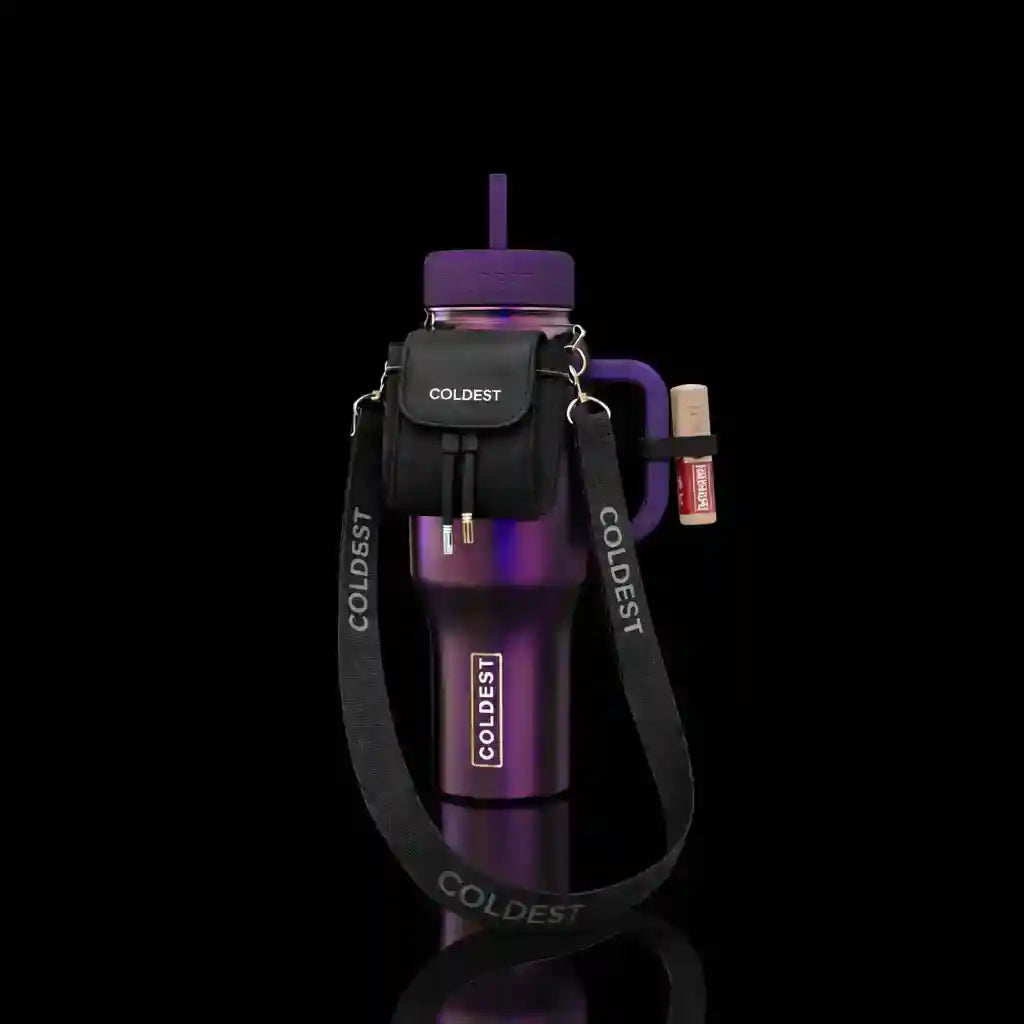 Purple water bottle with black carrying case on a black background