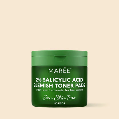 Green container of Maree 2% Salicylic Acid Blemish Toner Pads on a beige background