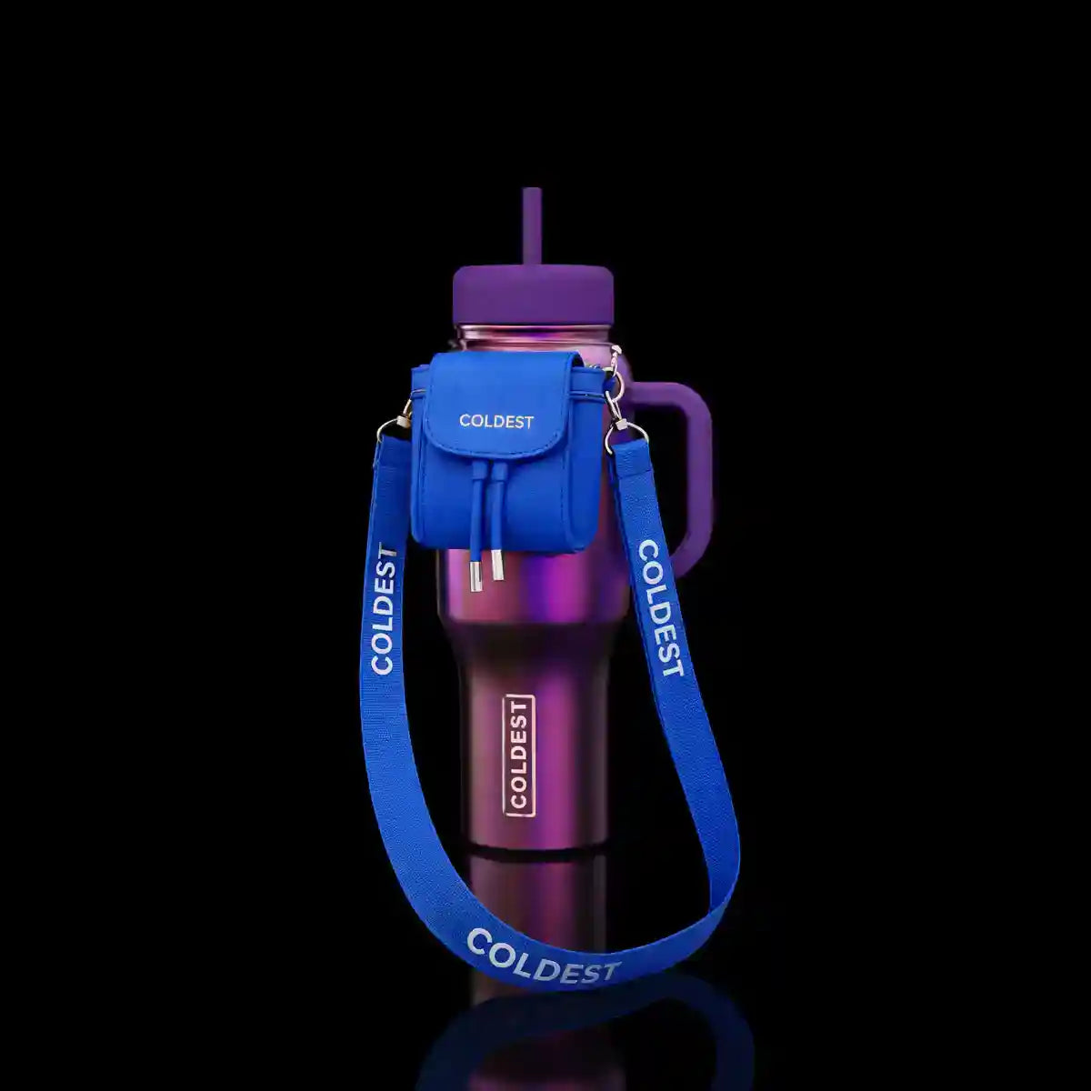 A purple and pink insulated water bottle with a handle, purple lid, blue shoulder bag, and blue strap printed with the brand name 'COLDEST', shown on a black reflective background.