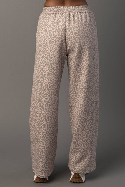 Leopard print pants on a gray background