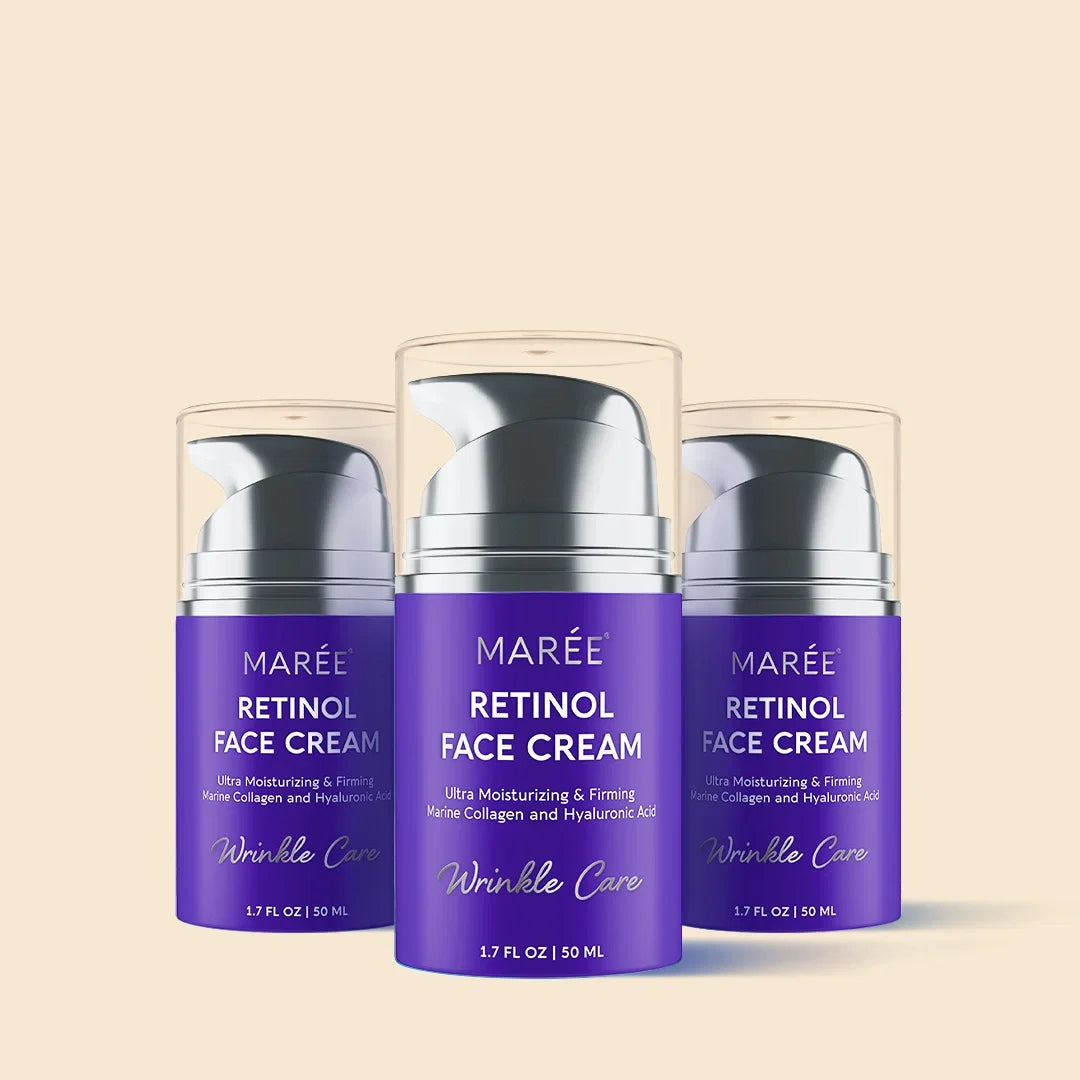Three purple Marée Retinol Face Cream pump bottles arranged in a row on a light beige background, with the center bottle slightly larger and in front.