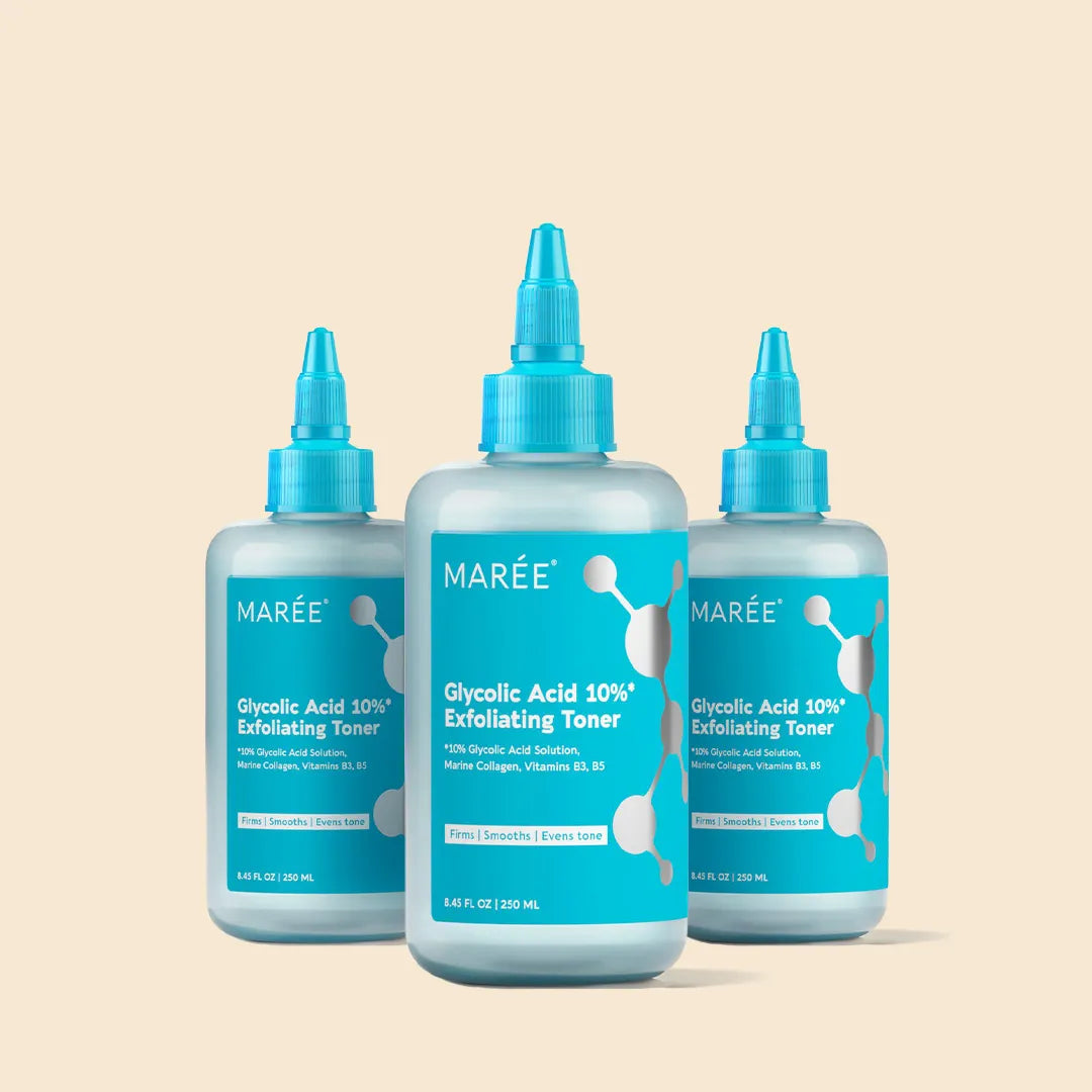Three bottles of Maree Glycolic Acid 10% Exfoliating Toner on a beige background